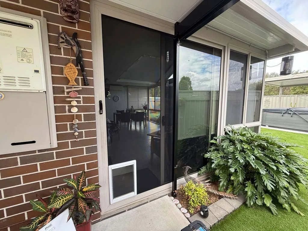 Dog doors for glass sliding doors with security screen